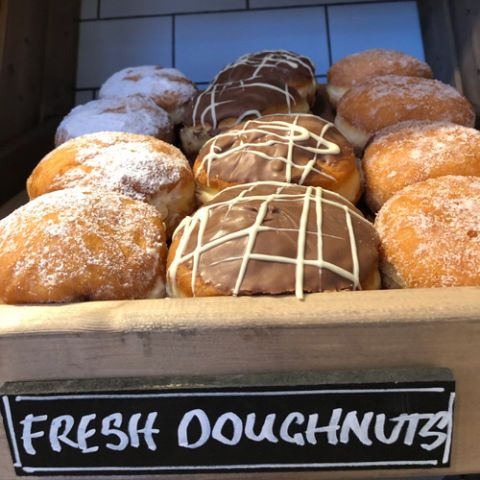 Doughnuts topped with chocolate